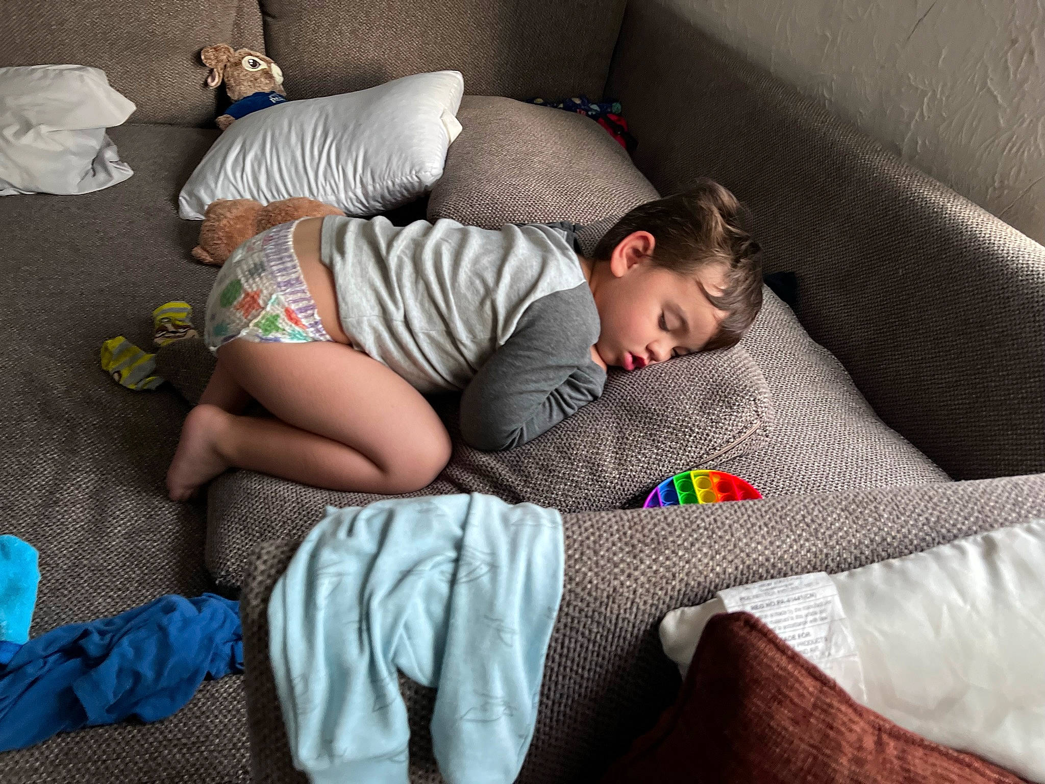 Brecken joined the competition — help win amazing prizes! baby, bedding, bedroom, child, comfort, couch, human_leg, joint, knee, leg, linens, mammal, person, pillow, room, sitting, sock, t_shirt, thigh, throw_pillow