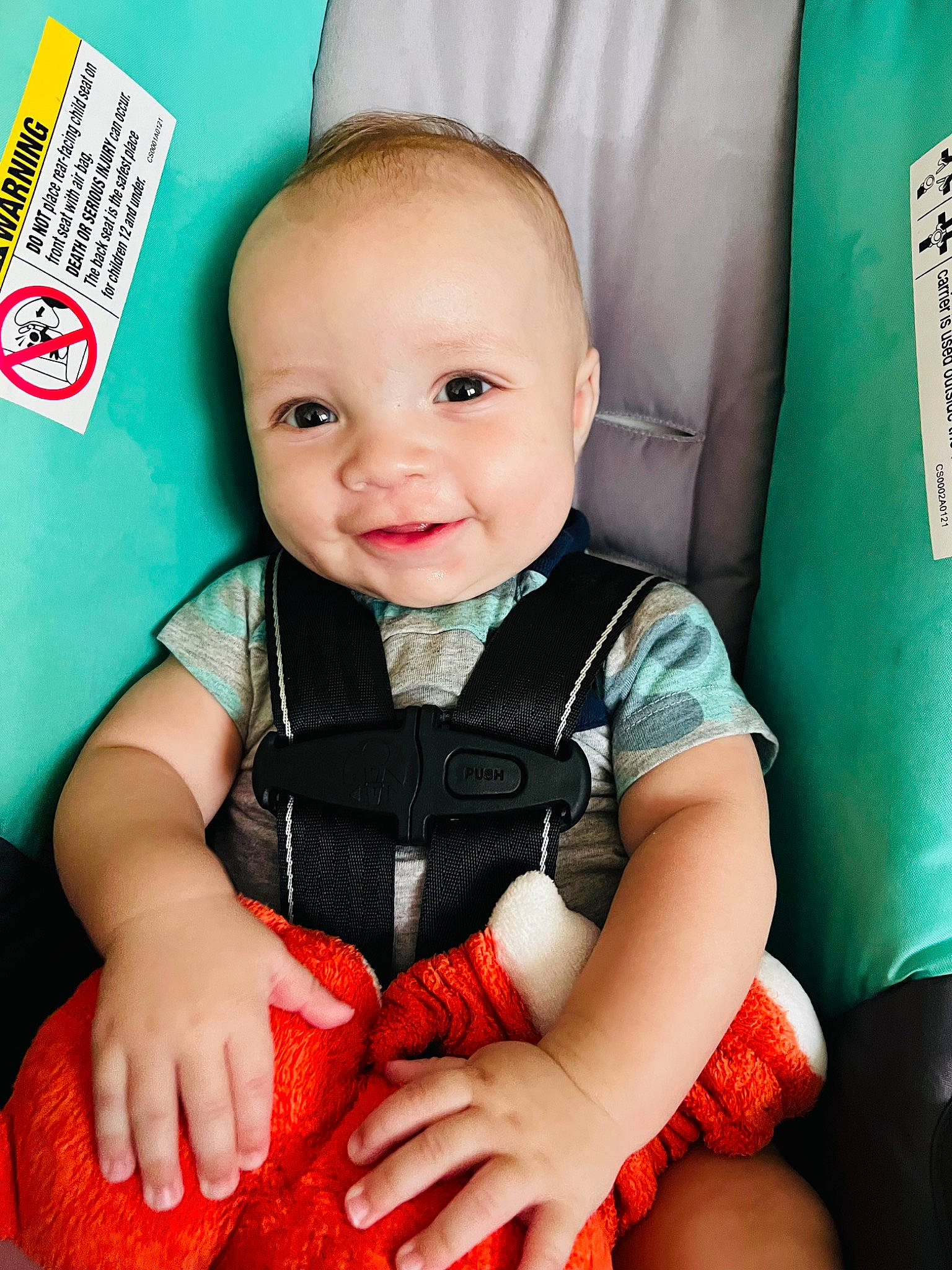 Caiden is registered to the contest to win money with this photo: baby, baby_toddler_clothing, cheek, chin, cool, eye, finger, green, hairstyle, happy, head, iris, joy, person, photograph, pink, product, skin, sleeve, smile