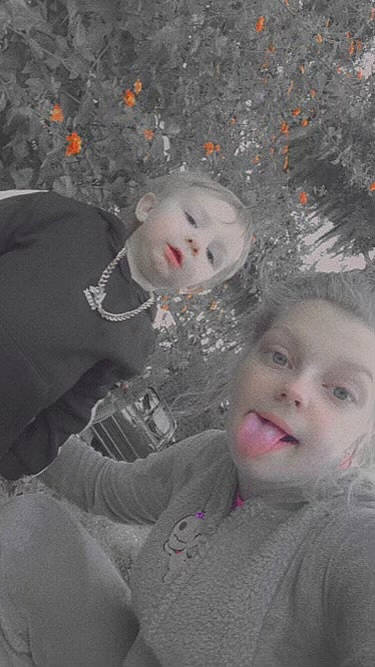 Clayton is registered to the contest to win money with this photo: art, baby, cheek, child, eye, eyebrow, face, freezing, fun, fur, grass, happy, head, lip, mouth, nose, person, smile, toddler, vacation