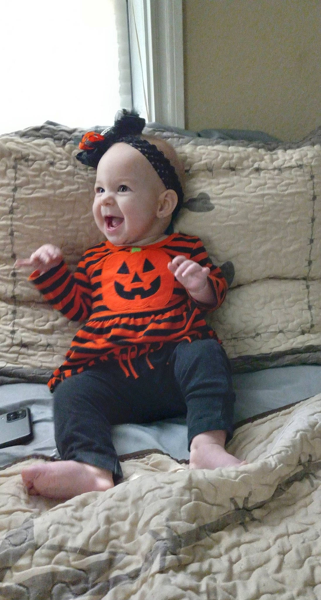 Caroline joined the competition — help win amazing prizes! art, baby, baby_toddler_clothing, child, comfort, costume, fun, happy, hat, headwear, linens, pattern, person, play, sitting, sleeve, smile, stuffed_toy, t_shirt, textile