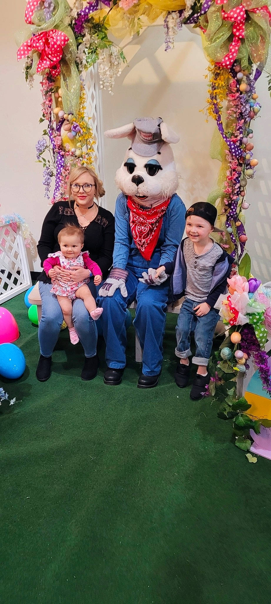 Rylee is registered to the contest to win money with this photo: balloon, blue, child, event, facial_expression, flower, fun, grass, green, happy, hat, headwear, holiday, joy, leisure, party_supply, person, pink, plant, recreation