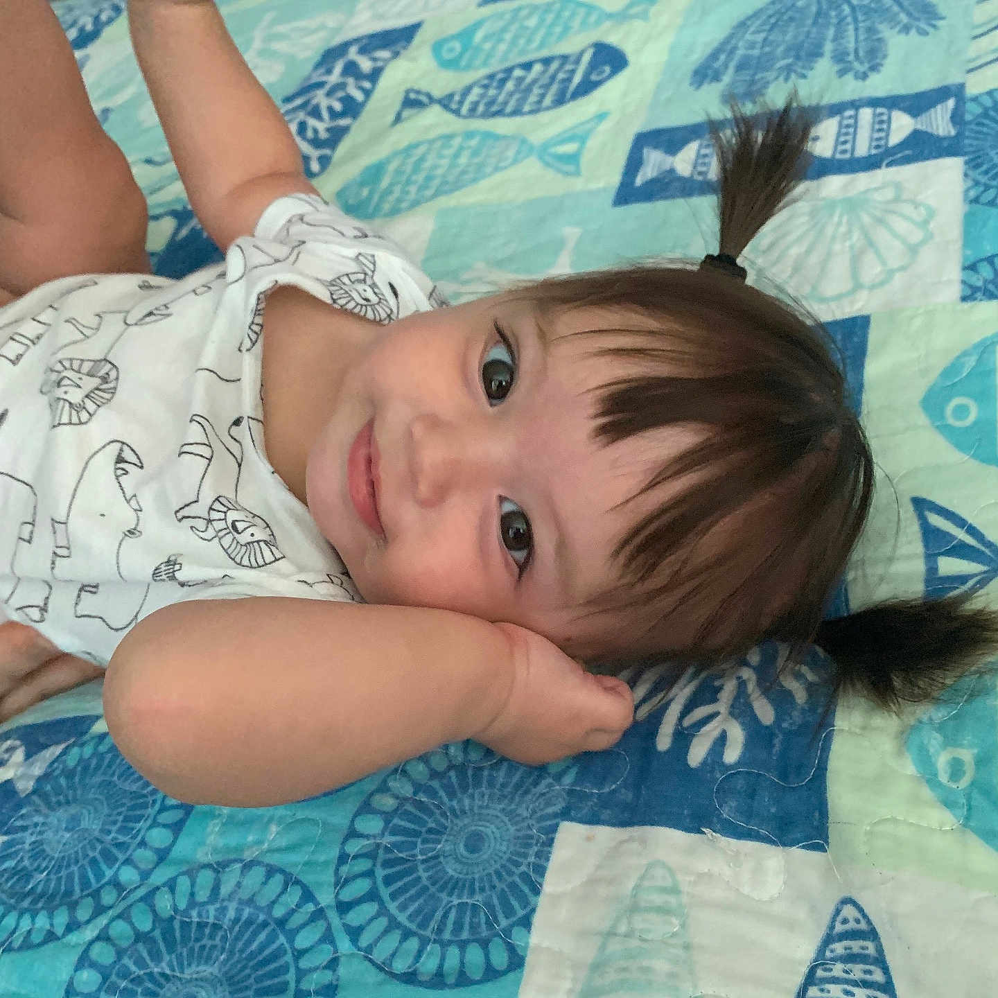 Gwendolyn is registered to the contest to win money with this photo: baby, bed, bedroom, blanket, clothing, cushion, face, furniture, happy, head, homedecor, indoors, linen, person, photography, portrait, quilt, room, smile, t_shirt