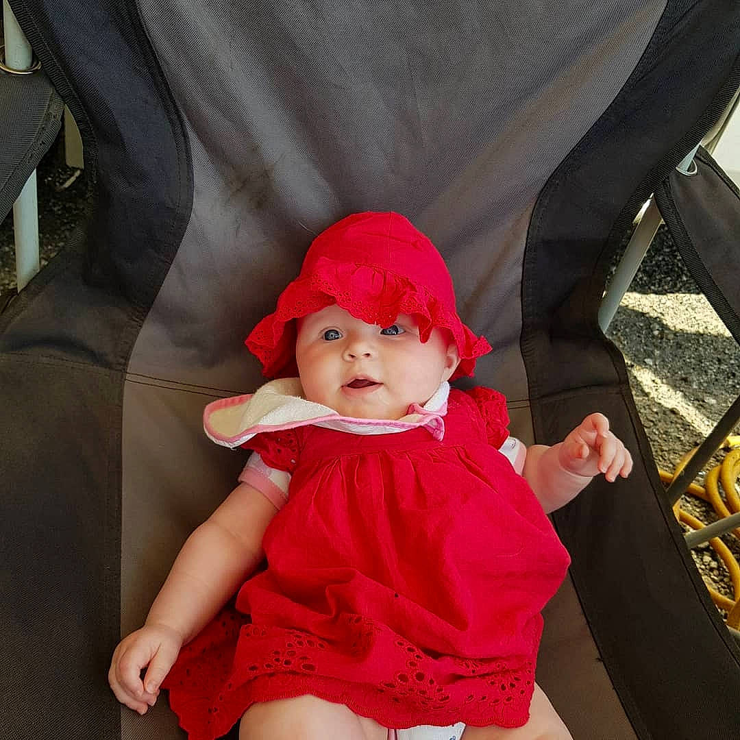 Lilly-mae joined the competition — help win amazing prizes! baby, baby_products, child, headgear, person, product, red, toddler