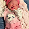 Diana is registered to the contest to win money with this photo: newborn, baby, infant, smiling, sleeping, portrait, pink, bow, headband, onesie, clothing, blanket, plush, cozy, lying_down, indoors, face, cute, cat_design, photography