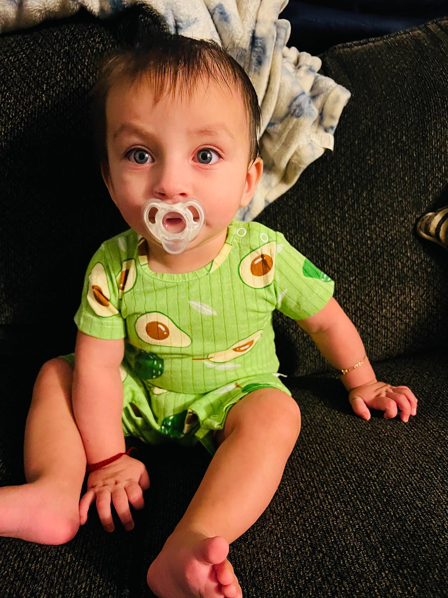 Lisandro is registered to the contest to win money with this photo: baby, baby_toddler_clothing, cheek, chin, collar, eye, eyelash, finger, grass, happy, head, human_body, iris, nose, person, product, skin, sleeve, smile, t_shirt