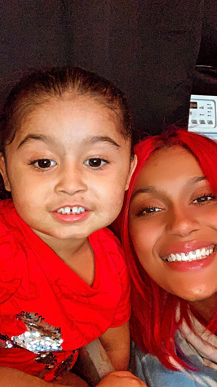 Jaylin is registered to the contest to win money with this photo: black_hair, cheek, cool, eye, eyebrow, eyelash, face, flash_photography, forehead, hair, happy, iris, joy, lip, lipstick, mouth, nose, person, red, skin