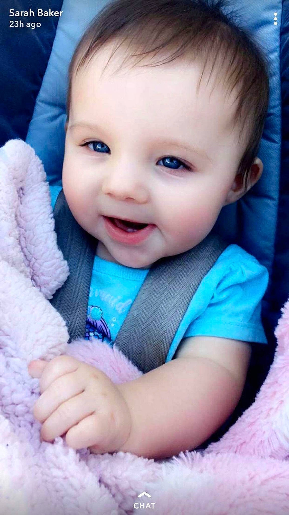 Khloie is registered to the contest to win money with this photo: baby, beauty, blue, cheek, child, child_model, chin, eye, face, facial_expression, finger, hand, head, iris, lip, nose, person, pink, skin, smile