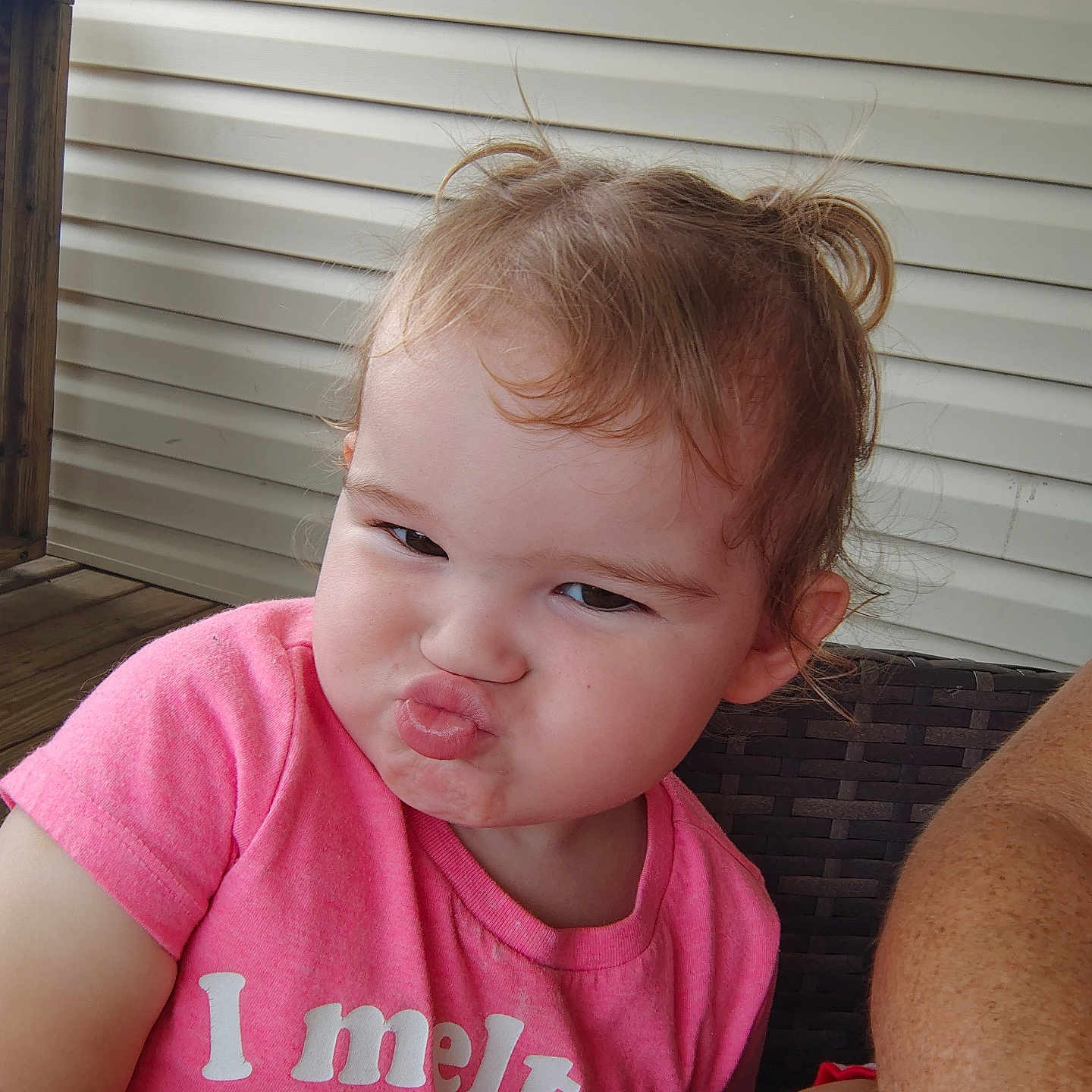 Elizabeth is registered to the contest to win money with this photo: baby, bodypart, clothing, couch, face, finger, frown, furniture, hand, happy, head, homedecor, mouth, person, photography, portrait, sad, sitting, t_shirt, wood
