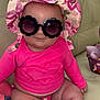 Nova joined the competition — help win amazing prizes! baby, child, sunglasses, hat, pink_clothing, heart_pattern, couch, indoor, toy, basket, smiling, chubby, cute, infant, fashion, portrait, seated, sun_hat, accessory, happy