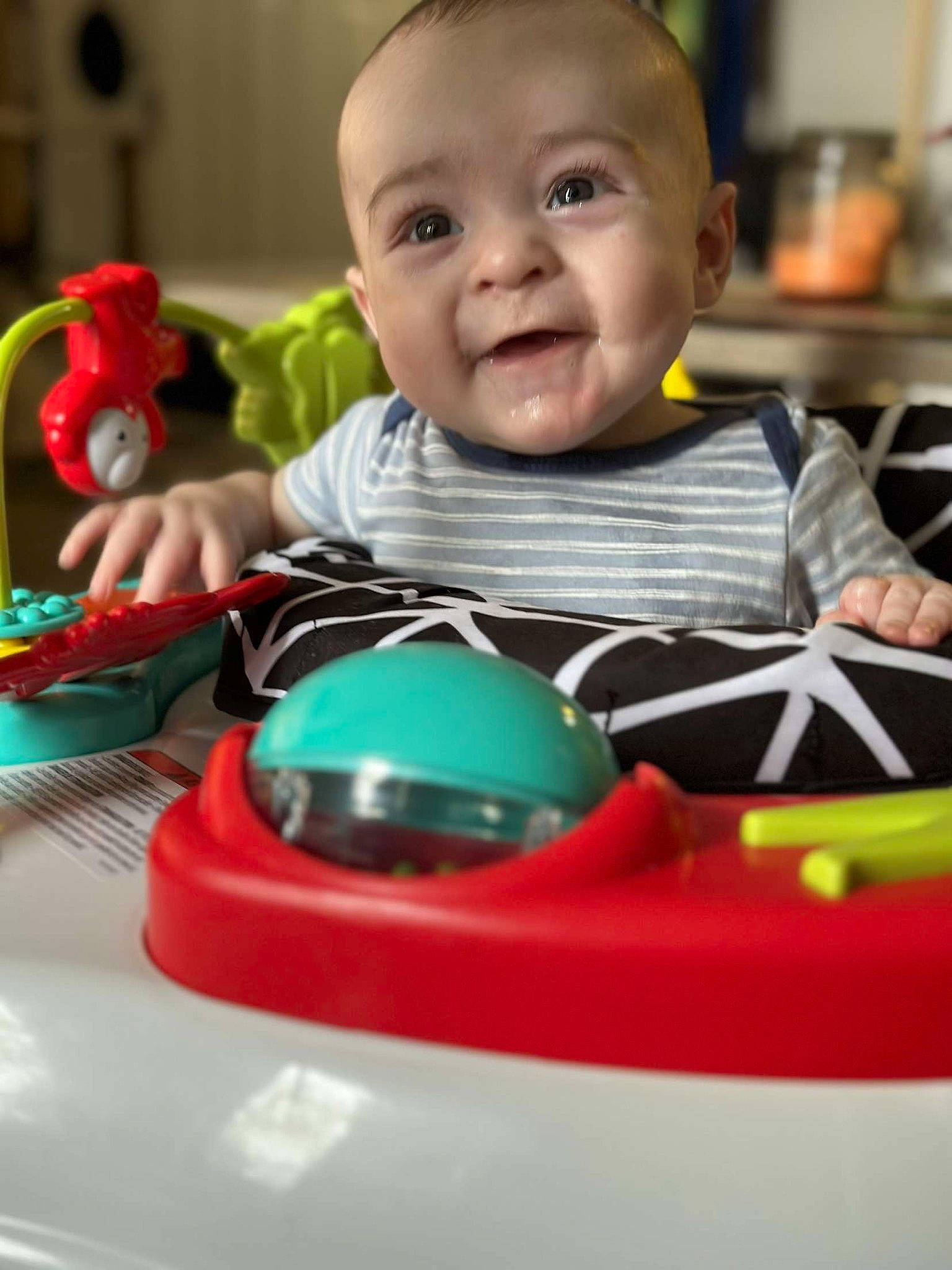 Ezra joined the competition — help win amazing prizes! baby, baby_playing_with_toys, baby_products, baby_toddler_clothing, baby_toys, cheek, child, event, face, fun, happy, head, leisure, person, play, recreation, room, sitting, smile, toddler