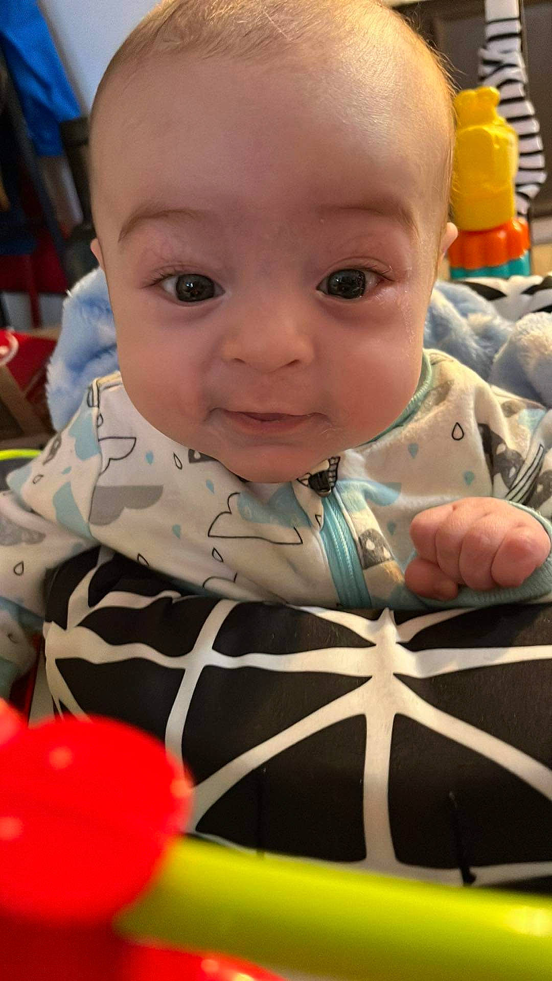 Ezra joined the competition — help win amazing prizes! baby, baby_products, baby_toddler_clothing, cheek, child, chin, event, facial_expression, fun, grass, happy, human, iris, mouth, nose, pattern, person, product, sitting, skin