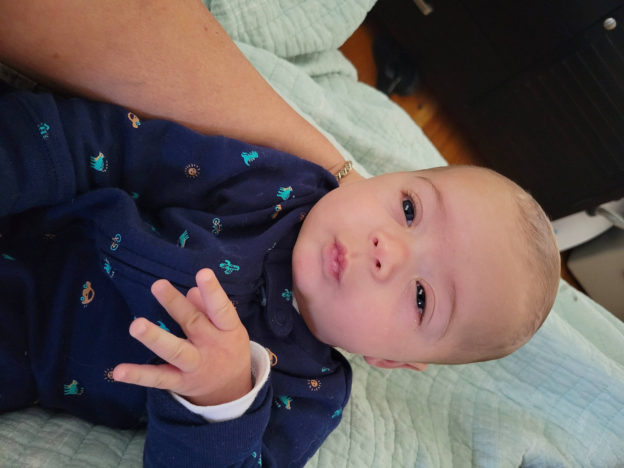 Noah is registered to the contest to win money with this photo: arm, baby, baby_toddler_clothing, cheek, elbow, eyelash, finger, fun, gesture, hand, happy, joint, mouth, neck, nose, person, skin, sleeve, thumb, toddler