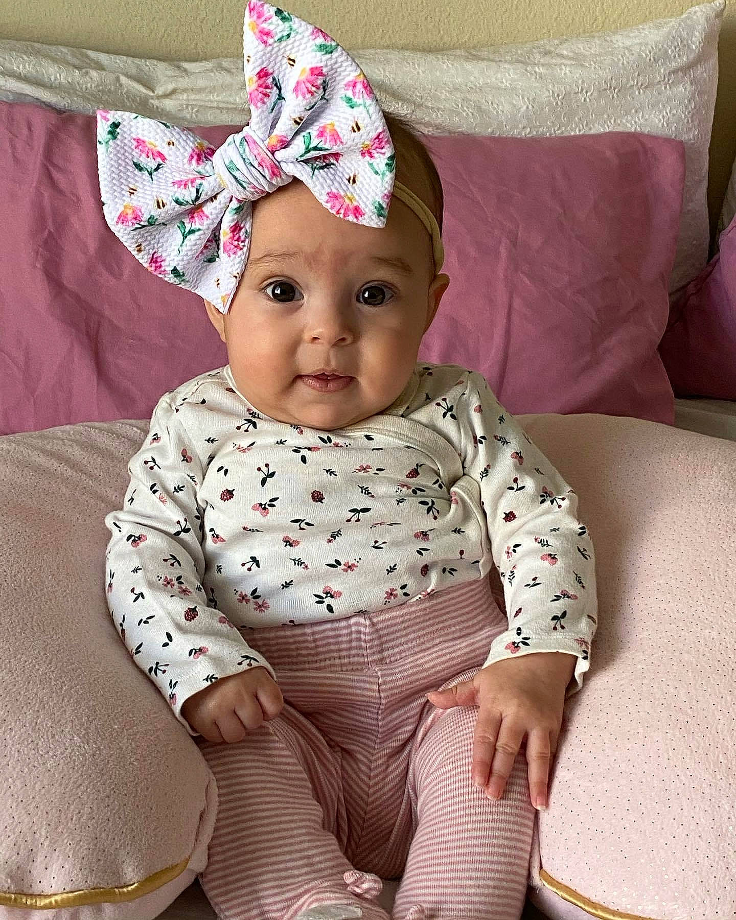 Elise joined the competition — help win amazing prizes! baby, baby_toddler_clothing, cap, comfort, costume_hat, face, happy, head, headgear, headwear, linens, magenta, outerwear, party_hat, person, pink, purple, skin, sleeve, textile