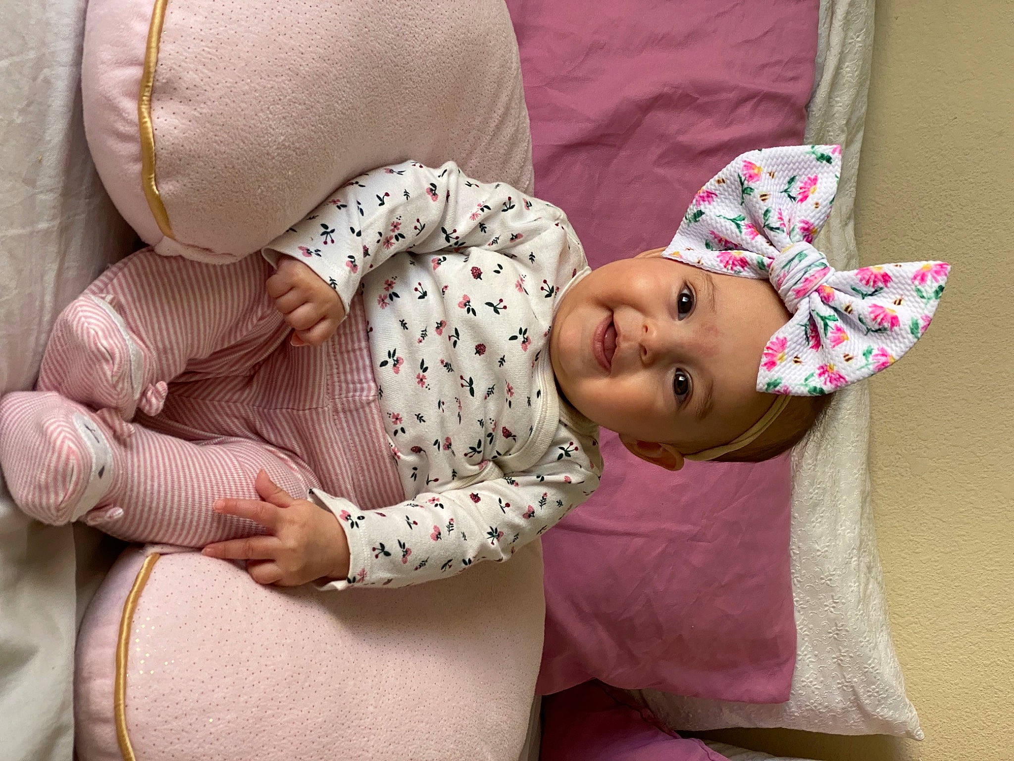 Elise joined the competition — help win amazing prizes! abdomen, baby, baby_products, baby_sleeping, baby_toddler_clothing, child, comfort, glasses, hat, headwear, linens, magenta, pattern, people, person, pink, product, sitting, sleeve, textile