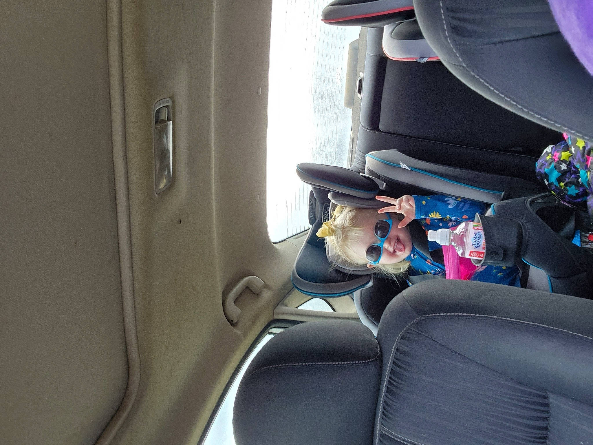 Alia is registered to the contest to win money with this photo: auto_part, automotive_design, automotive_exterior, car, car_seat, car_seat_cover, comfort, family_car, fixture, head_restraint, luxury_vehicle, mid_size_car, mode_of_transport, motor_vehicle, person, personal_luxury_car, seat_belt, transport, vehicle, vehicle_door