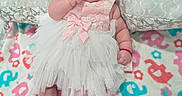 Mayleni joined the competition — help win amazing prizes! baby, infant, child, portrait, lying_down, pink_outfit, white_dress, headband, bow, smiling, face, eyes, blanket, alphabet_blanket, bed, indoors, textile, fashion, cute, photography