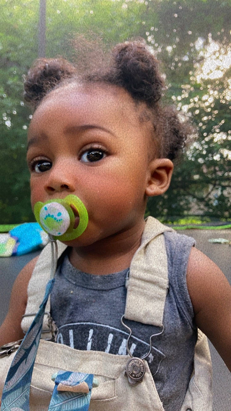 Legend joined the competition — help win amazing prizes! afro, audio_equipment, child, ear, entertainment, event, eyelash, fun, grass, happy, leisure, microphone, nose, performing_arts, person, recreation, summer, t_shirt, toddler, tree