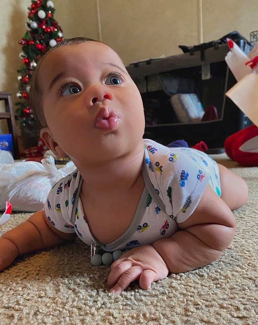 Koa is registered to the contest to win money with this photo: baby, baby_toddler_clothing, barefoot, beauty, carmine, child, facial_expression, floor, flooring, foot, fun, happy, human_leg, leg, pattern, person, play, sitting, skin, toddler