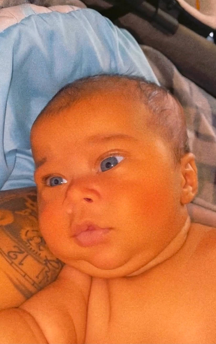 Koa is registered to the contest to win money with this photo: baby, cheek, ear, eye, eyebrow, eyelash, forehead, hair, hairstyle, hand, head, human_body, iris, lip, mouth, neck, nose, organ, person, skin