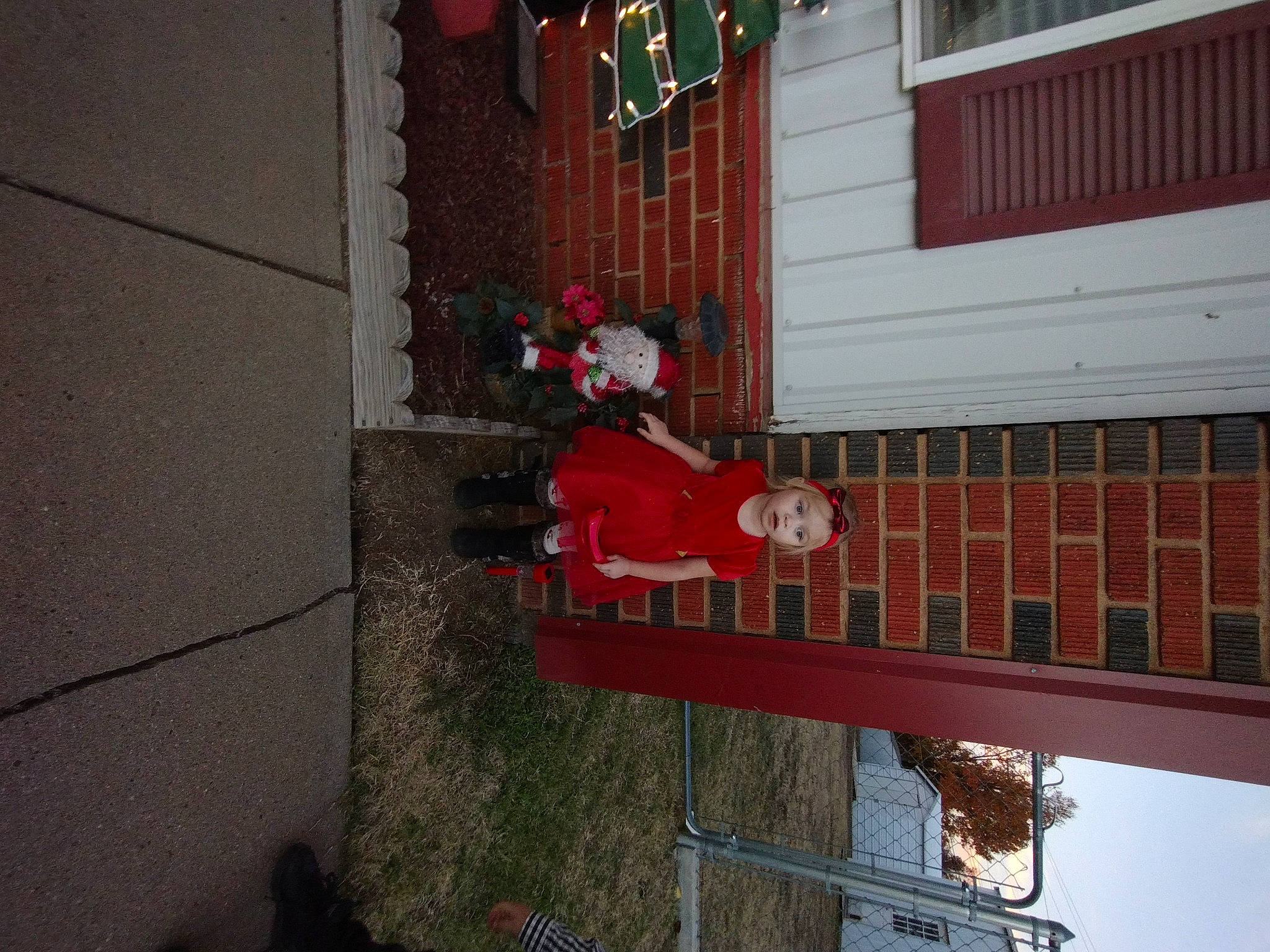 Jazzebel is registered to the contest to win money with this photo: brick, brickwork, building, carmine, concrete, coquelicot, facade, holiday, house, person, plant, red, sidewalk, siding, tree, window, winter, wood