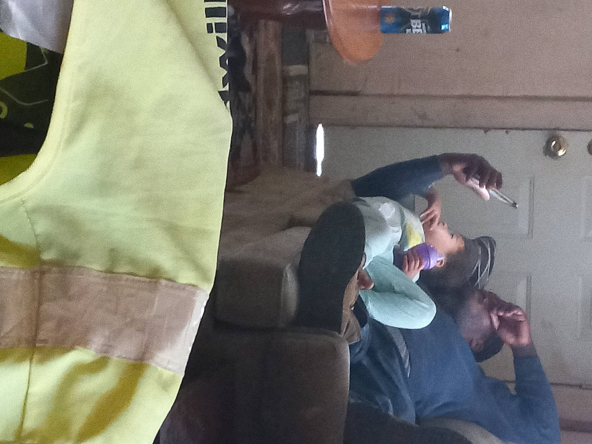 Taelynn is registered to the contest to win money with this photo: bedding, blanket, comfort, denim, elbow, flooring, fun, human_leg, jeans, knee, linens, pattern, person, recreation, room, sitting, sleeve, sportswear, t_shirt, thigh