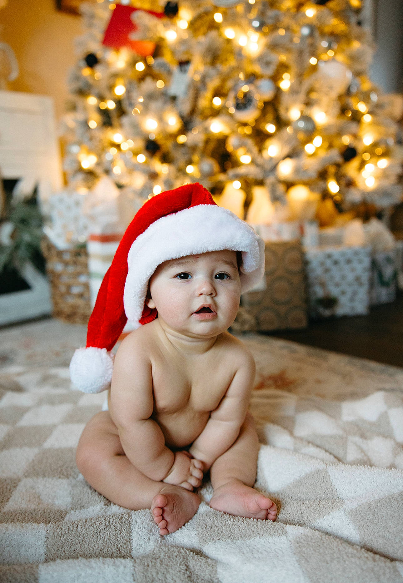 Winston joined the competition — help win amazing prizes! baby, baby_toddler_clothing, christmas, christmas_decoration, christmas_eve, christmas_ornament, christmas_tree, conifer, decoration, event, flooring, happy, headwear, holiday, holiday_ornament, ornament, person, plant, room, toddler