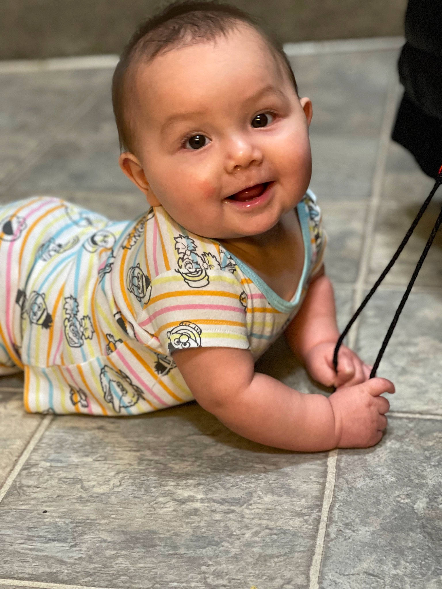 Jacelynn is registered to the contest to win money with this photo: baby, baby_toddler_clothing, cheek, child, eye, face, floor, flooring, grass, happy, iris, joy, leisure, nose, person, plant, skin, smile, standing, toddler