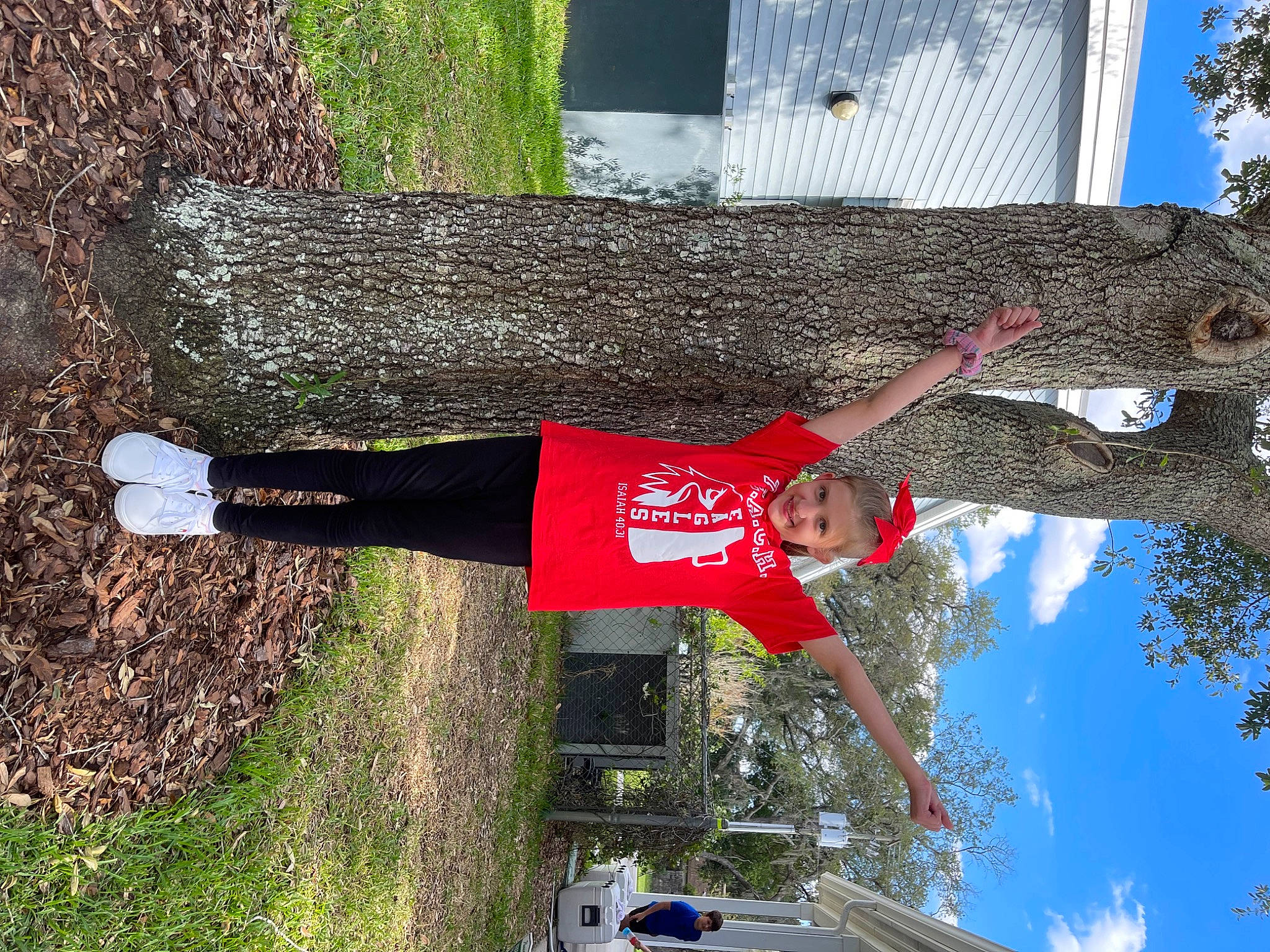 Ellianna is registered to the contest to win money with this photo: carmine, cloud, grass, joy, leisure, line, outdoor_shoe, person, plant, pole, red, sky, sports_uniform, t_shirt, tree, trunk, walking_shoe, woody_plant, world