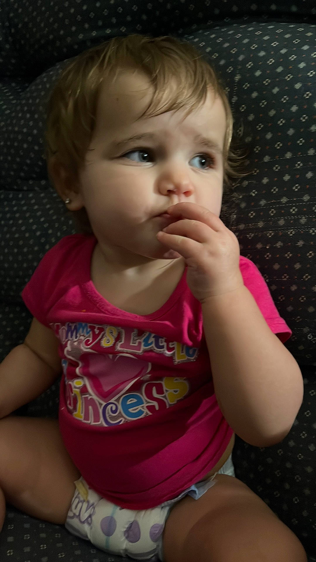 Isabella is registered to the contest to win money with this photo: arm, baby_toddler_clothing, cheek, chin, clothing, ear, eyebrow, eyelash, finger, gesture, iris, lip, mouth, neck, nose, organ, person, pink, skin, sleeve