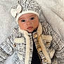 Marley a rejoint le concours — aidez-le/la à gagner de superbes lots ! accessories, baby, beanie, bonnet, cap, clothing, coat, face, hat, head, hood, jacket, jewelry, necklace, newborn, person, photography, portrait, scarf, toy