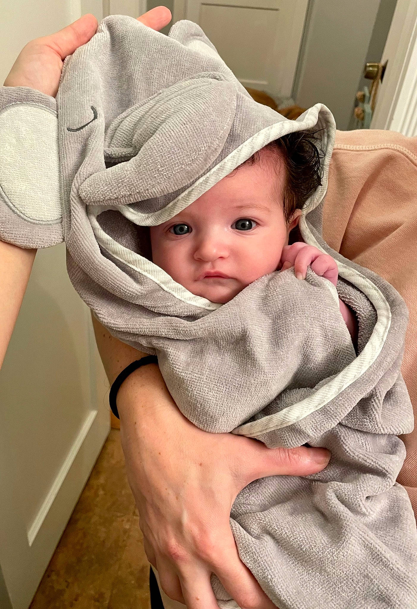 Alexandra is registered to the contest to win money with this photo: baby, baby_products, baby_toddler_clothing, cap, cheek, child, comfort, fashion_accessory, gesture, hair_accessory, hand, hat, headgear, headwear, linens, pattern, person, sitting, skin, sleeve