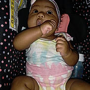 Raquel joined the competition — help win amazing prizes! arm, baby, baby_toddler_clothing, cap, cheek, facial_expression, finger, gesture, hand, happy, human_body, lip, mouth, organ, pink, skin, textile, thigh, thumb, toddler