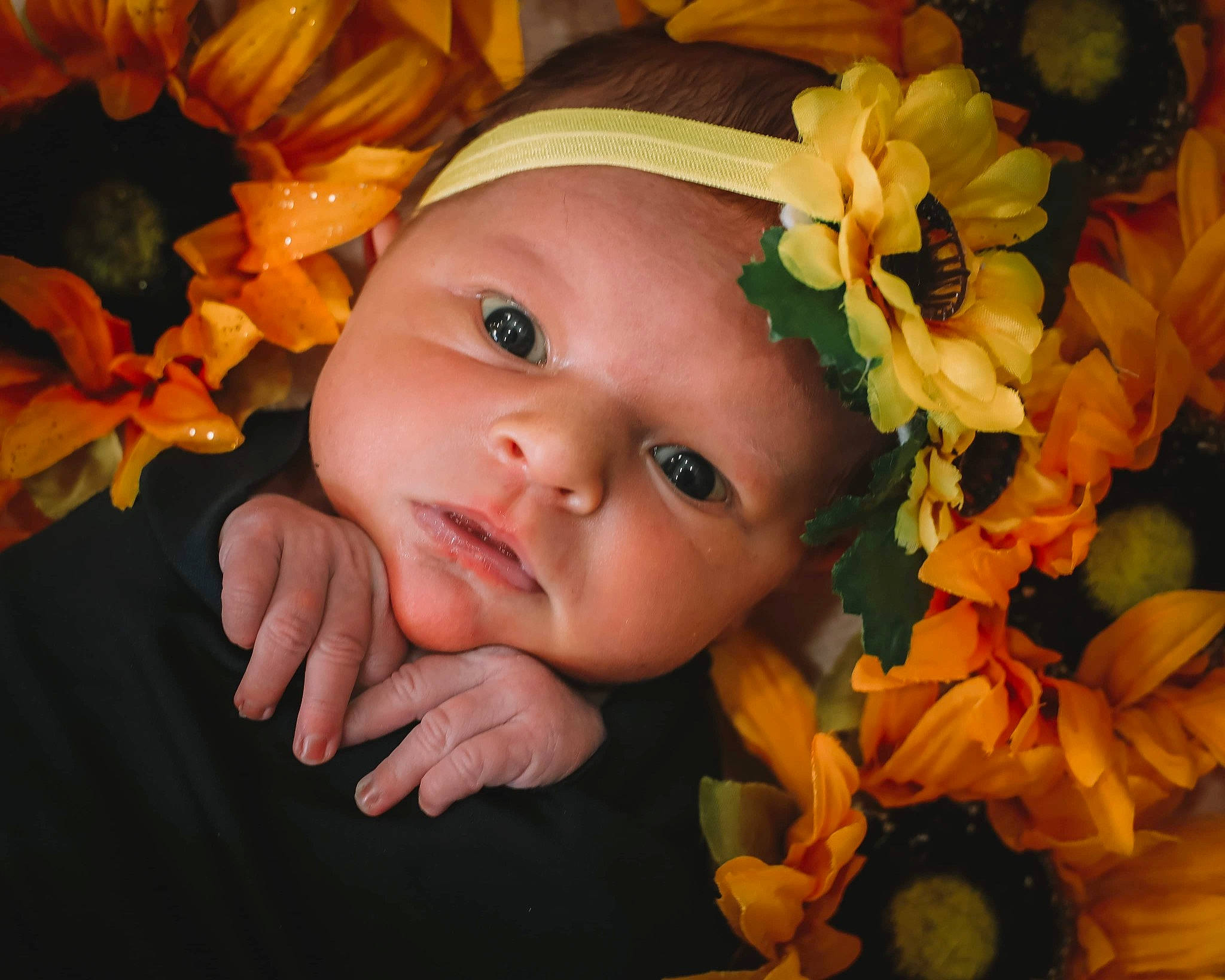 Lakelyn joined the competition — help win amazing prizes! baby, cheek, finger, flower, hand, happy, headwear, human_body, iris, leaf, lip, mouth, nose, orange, organism, people_in_nature, person, plant, skin, smile