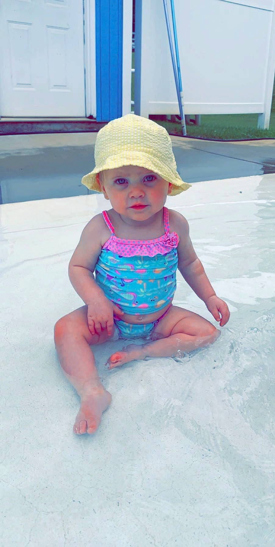 Anniston joined the competition — help win amazing prizes! baby, baby_toddler_clothing, child, clothing, fashion_accessory, fun, hat, headgear, headwear, person, play, smile, sun_hat, toddler, vacation