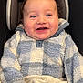 baby, infant, smiling, happy, car_seat, seat, blanket, fleece_jacket, blue_jacket, cheeks, eyes, mouth, teeth, hand, portrait, close_up, cozy, stroller, cute, child
