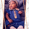 baby, infant, child, portrait, lying_down, blue_outfit, hat, headband, plaid, shoes, white_shoes, cushion, indoor, fashion, cute, face, eyes_open, baby_photo, decorative_frame, marble_background