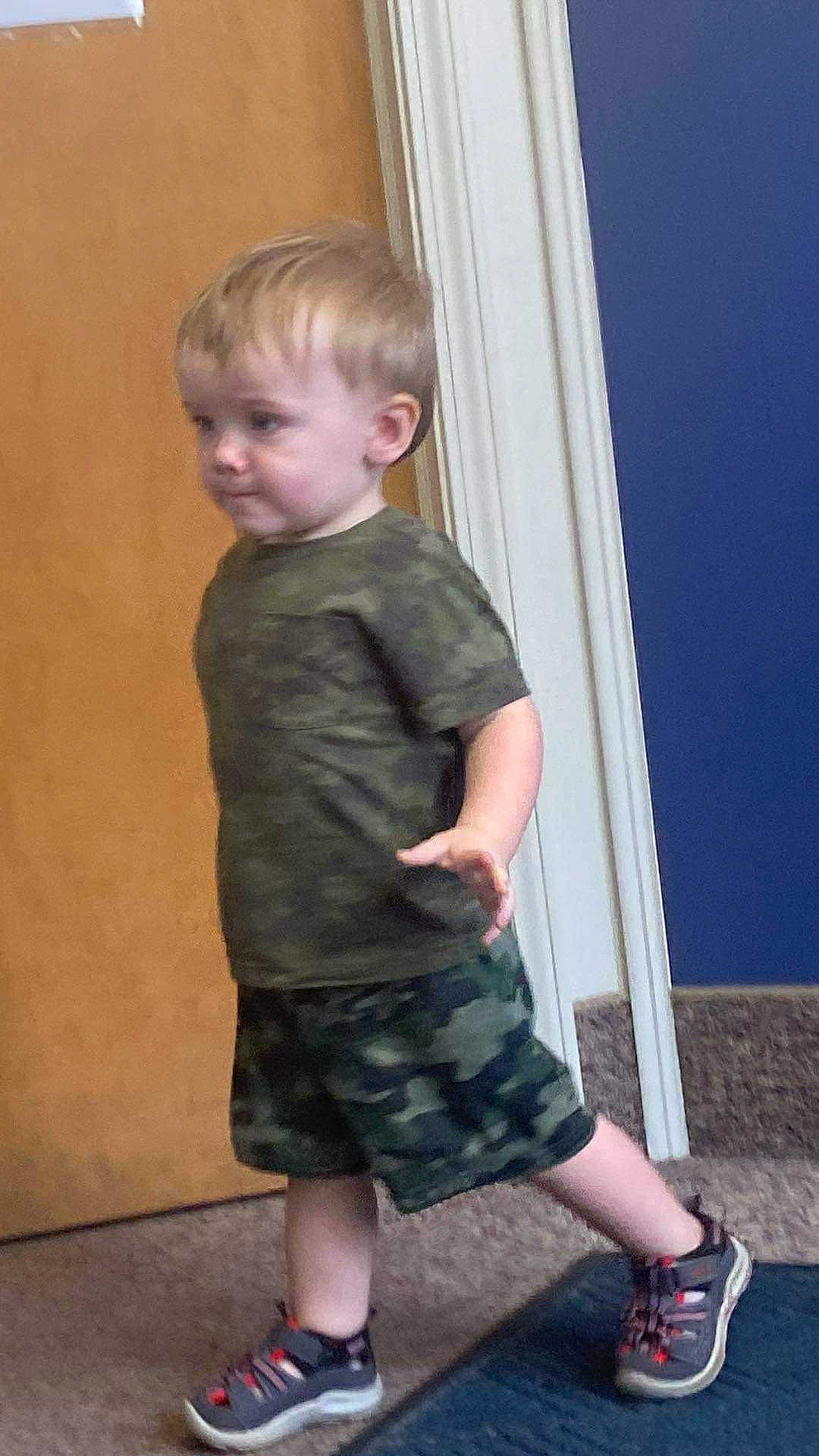 Bryson joined the competition — help win amazing prizes! baby_toddler_clothing, blond, calf, child, electric_blue, fun, happy, human_leg, knee, pattern, person, plaid, shorts, sitting, sleeve, sock, standing, t_shirt, tartan, toddler