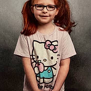 Chloe joined the competition — help win amazing prizes! child, girl, pigtails, red_hair, glasses, hello_kitty, tshirt, smile, standing, portrait, casual_clothing, cute, young, happy, studio_background, hands_clasped, innocent, fashion, person, kid