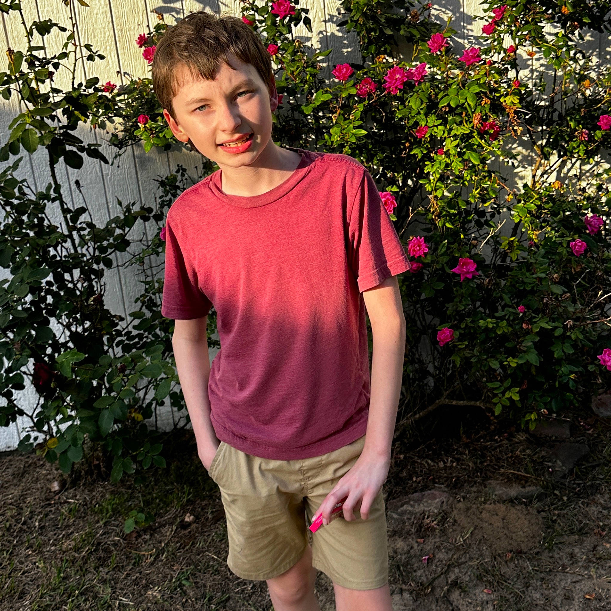 Casey joined the competition — help win amazing prizes! botany, clothing, electric_blue, flower, grass, happy, human_body, joy, leisure, magenta, neck, outerwear, people_in_nature, person, pink, plant, shoulder, sleeve, t_shirt, thigh