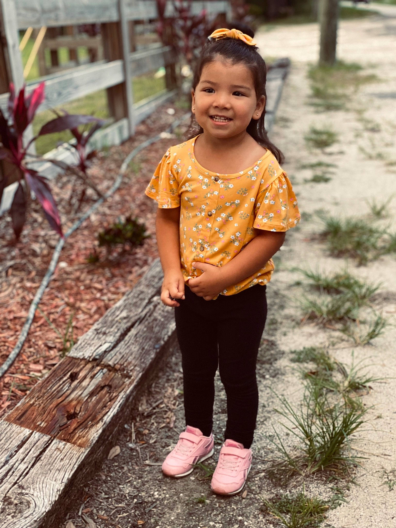 Nessiah is registered to the contest to win money with this photo: adaptation, child, fun, grass, hairstyle, happy, joy, leisure, magenta, nature, people_in_nature, person, pink, plant, recreation, sandal, skin, smile, soil, toddler