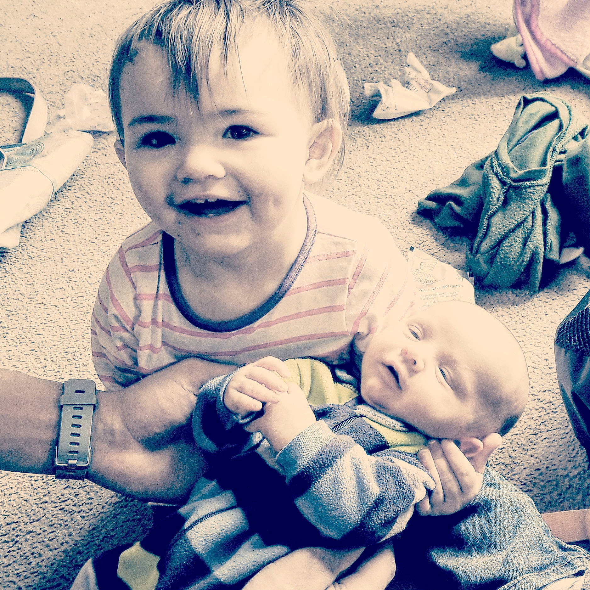 Mia is registered to the contest to win money with this photo: baby, black_and_white, cheek, child, cloud, cool, eye, face, facial_expression, fun, hand, happy, head, joy, people, person, photography, play, skin, sky