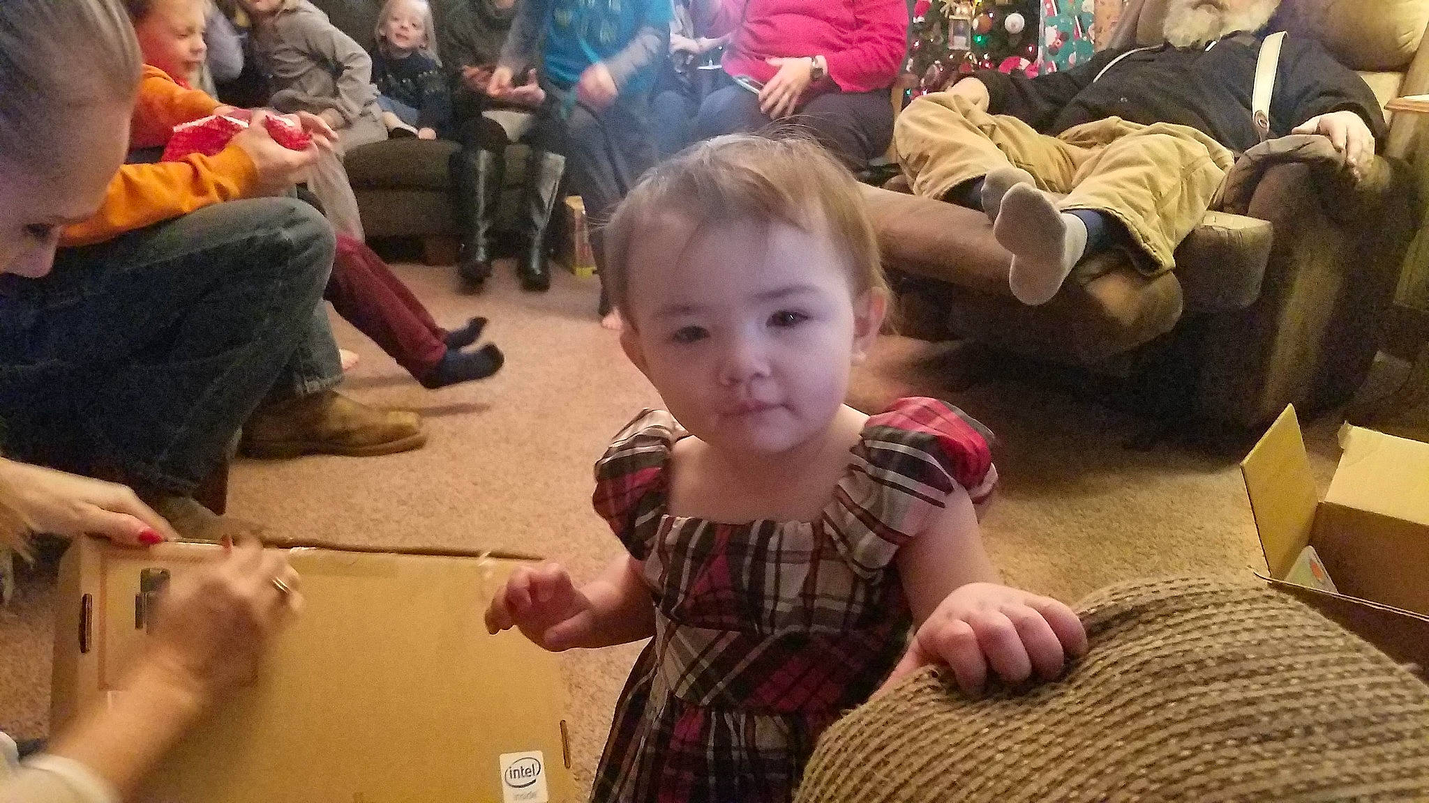 Mia is registered to the contest to win money with this photo: baby, cheek, child, ear, eye, face, finger, fun, head, human, human_body, kindergarten, leg, mouth, people, person, play, room, sitting, snapshot