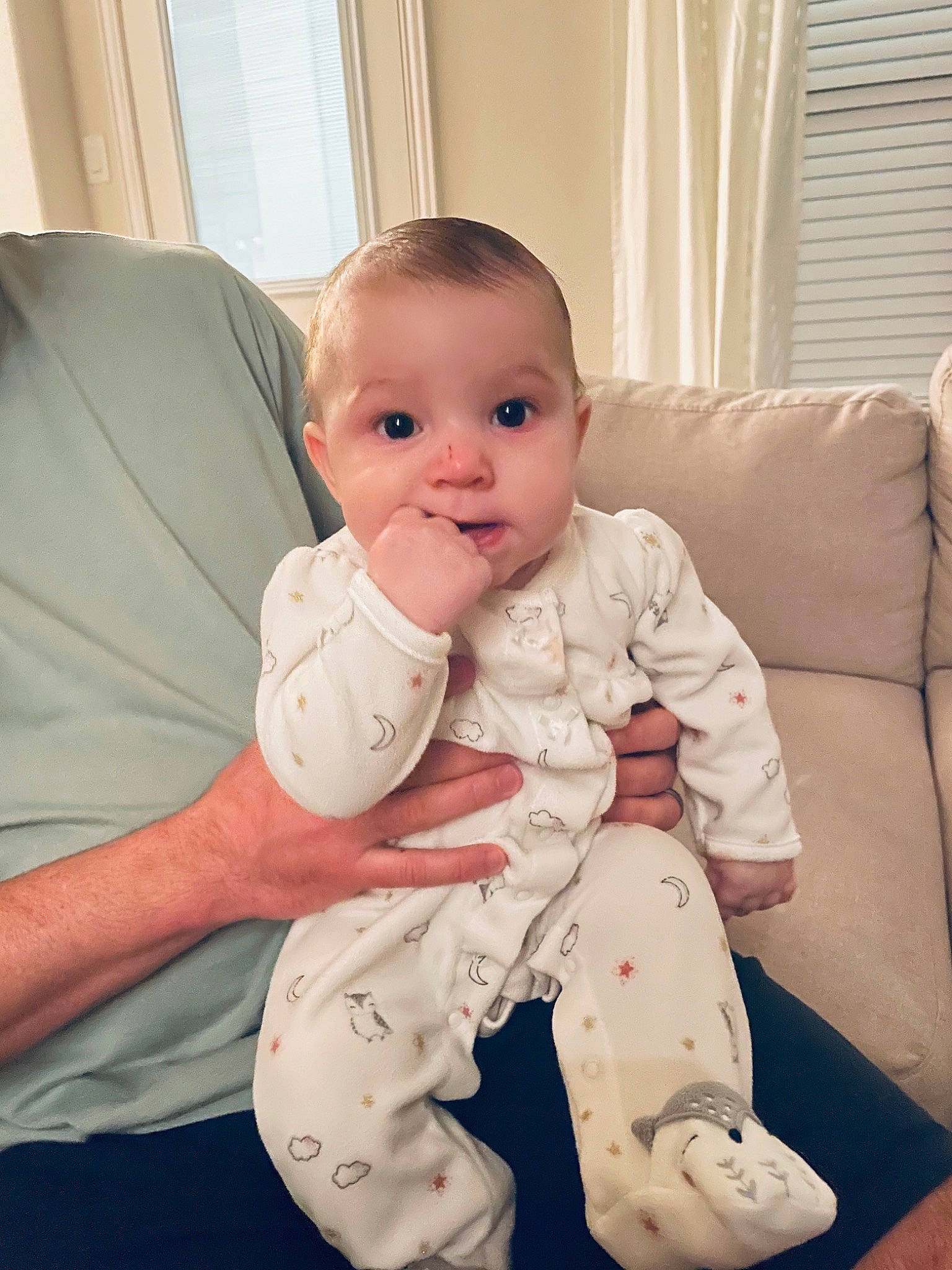 Sloan is registered to the contest to win money with this photo: baby, baby_toddler_clothing, comfort, couch, curtain, elbow, facial_expression, foot, hairstyle, happy, joint, knee, person, shoulder, skin, sleeve, smile, standing, thigh, toddler