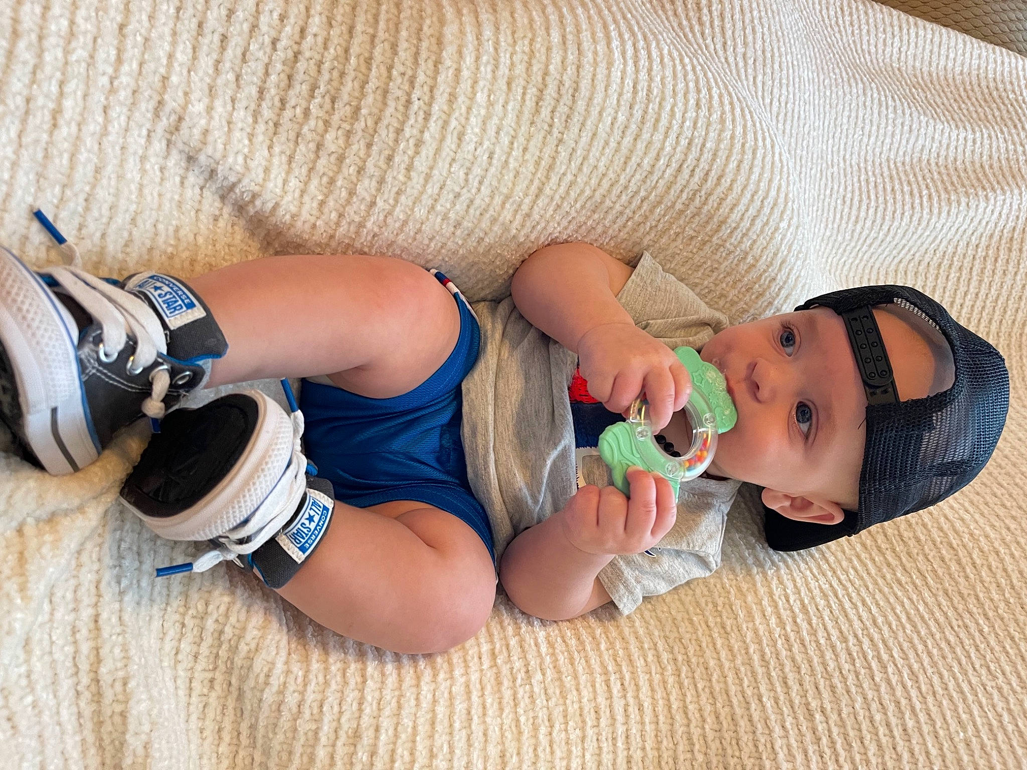 Krew is registered to the contest to win money with this photo: arm, baby, baby_toddler_clothing, chest, child, comfort, eyewear, finger, hand, head, headwear, human_body, human_leg, joint, knee, leg, muscle, nail, person, skin