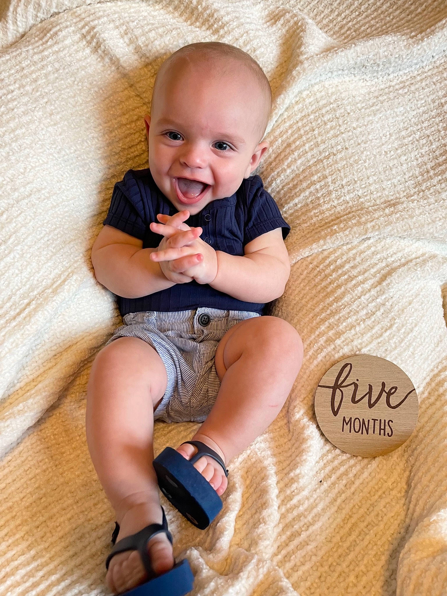 Krew is registered to the contest to win money with this photo: arm, baby, baby_toddler_clothing, comfort, face, finger, flash_photography, floor, happy, head, human_body, knee, leg, person, product, skin, sleeve, smile, thigh, toddler