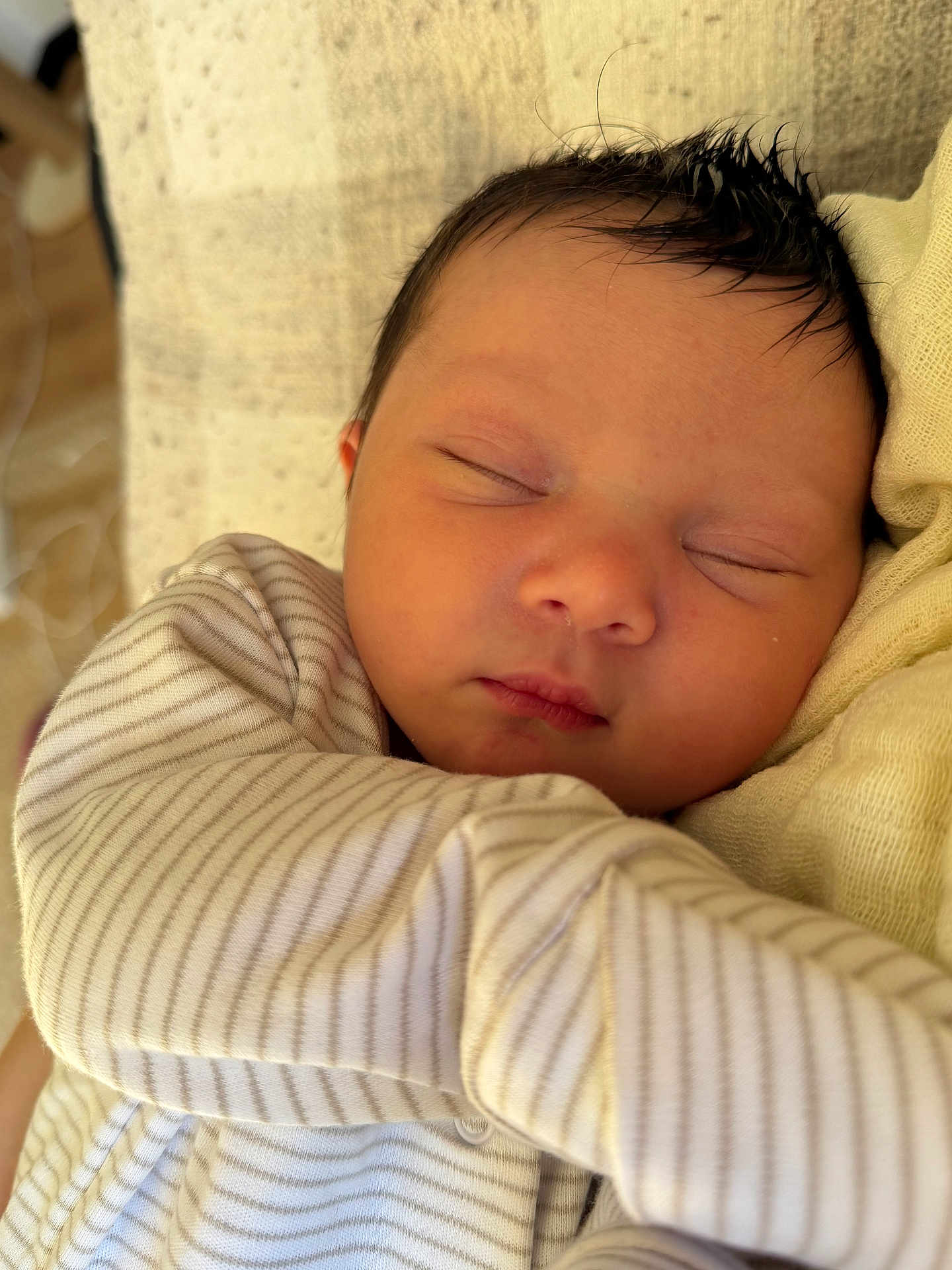 Anaya joined the competition — help win amazing prizes! baby, newborn, sleeping, face, closeup, striped_clothing, blanket, soft, cozy, peaceful, infant, cute, portrait, child, resting, indoors, skin, head, young, toddler