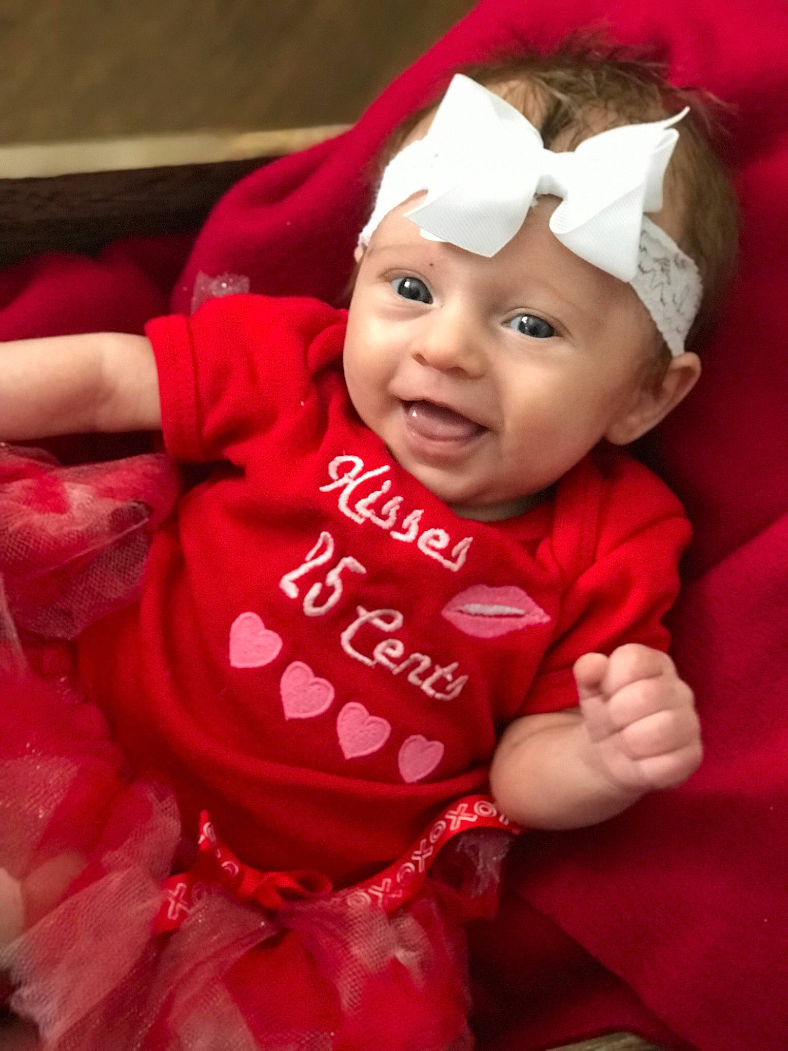 Myah is registered to the contest to win money with this photo: baby, cheek, child, face, facial_expression, fun, happy, head, headgear, headwear, laugh, lip, person, pink, red, skin, smile, toddler