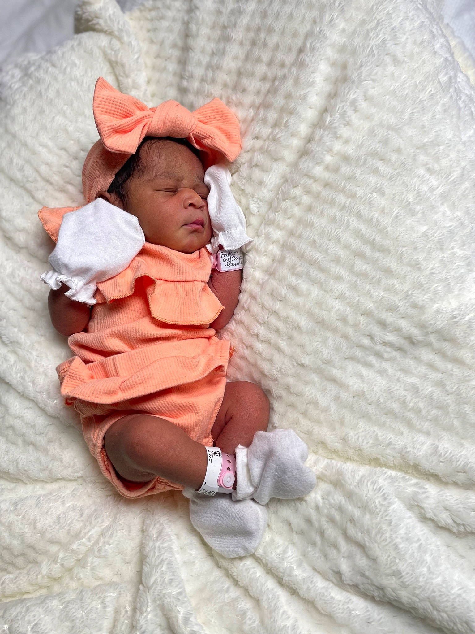 Emani joined the competition — help win amazing prizes! baby, baby_products, baby_sleeping, baby_toddler_clothing, comfort, eye, foot, head, human_body, human_leg, knee, lap, leg, linens, person, sleeve, sock, thigh, toddler, wood