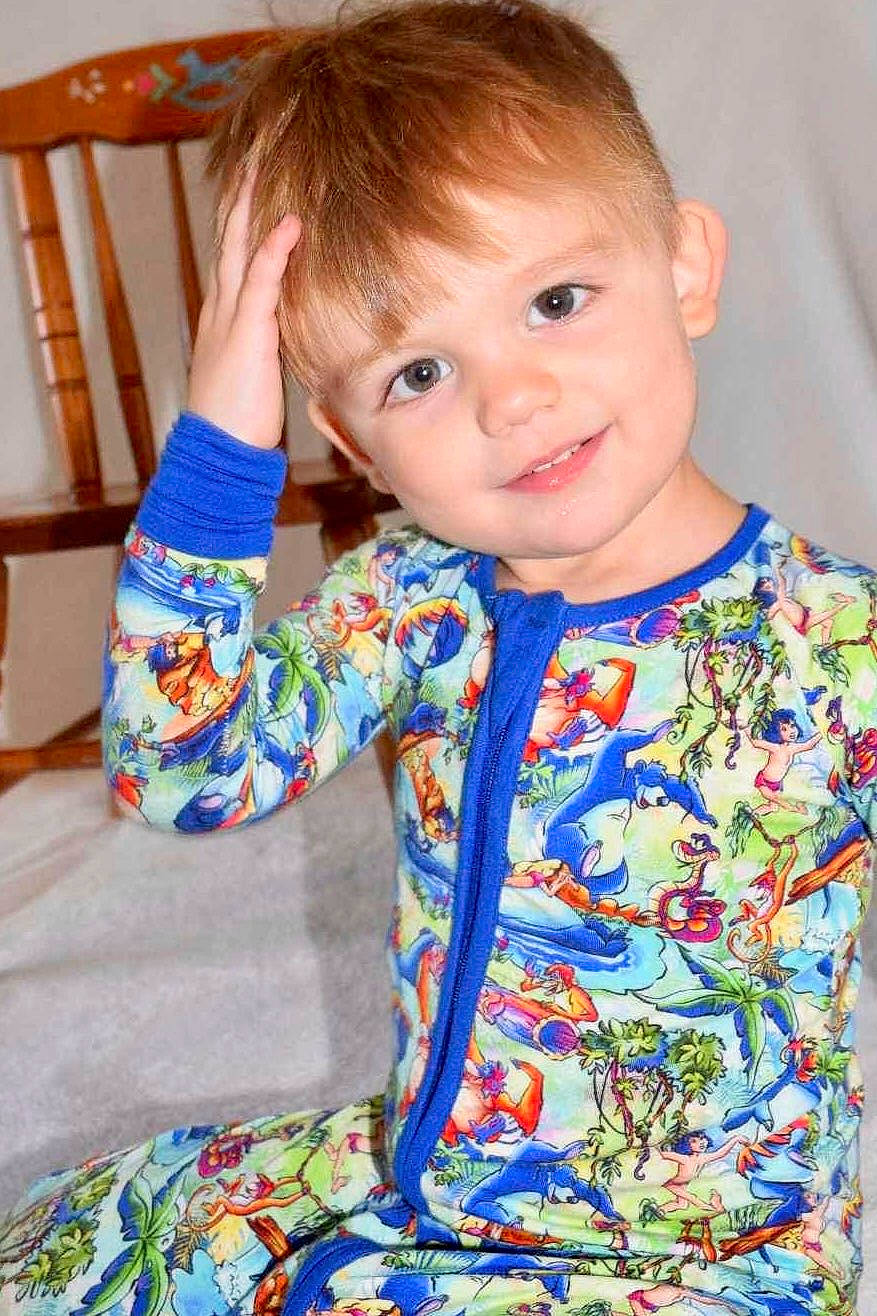 Timothy is registered to the contest to win money with this photo: arm, baby_toddler_clothing, chair, cheek, child, dress, electric_blue, face, hairstyle, happy, head, iris, joy, neck, pattern, person, skin, sleeve, smile, t_shirt