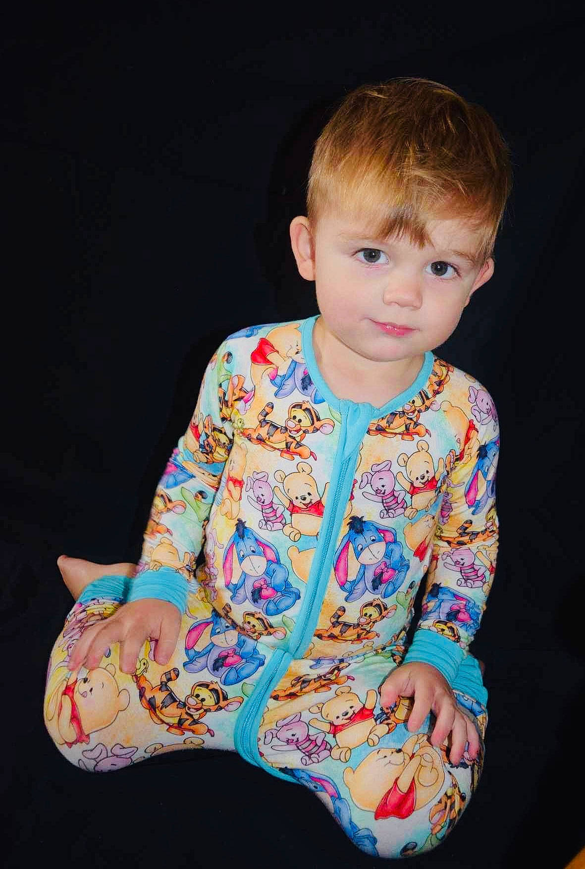 Timothy is registered to the contest to win money with this photo: baby_toddler_clothing, cheek, child, chin, elbow, electric_blue, fun, hair, happy, human_body, human_leg, neck, pattern, person, play, sitting, skin, sleeve, t_shirt, toddler